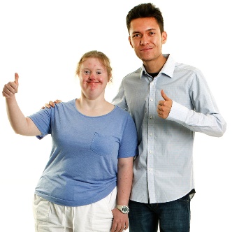 A man and woman giving a thumbs up. 