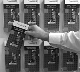 Photo of Commonwealth Ombudsman brochure display at shopfront