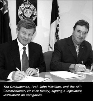 The Ombudsman, Prof. John McMillan, and the AFP Commissioner, Mr Mick Keelty, signing a legislative instrument on categories.