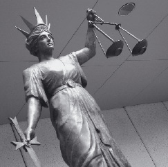 Photo: Scales of justice. Image courtesy of Griffith University