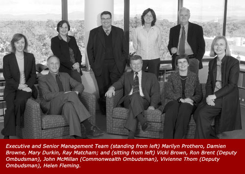 Executive and Senior Management Team (standing from left) Marilyn Prothero, Damien Browne, Mary Durkin, Ray Matcham; and (sitting from left) Vicki Brown, Ron Brent (Deputy Ombudsman), John McMillan (Commonwealth Ombudsman), Vivienne Thom (Deputy Ombudsman), Helen Fleming.