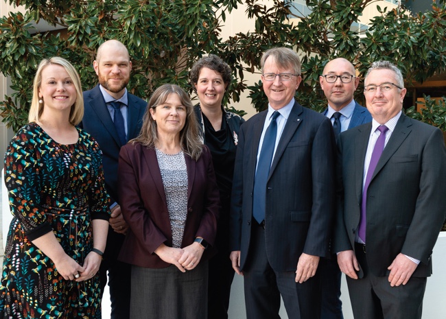 Photo of Senior Leadership Group – Left to right: Autumn O'Keeffe, Paul Pfitzner, Fiona Sawyers, Jaala Hinchcliffe, Michael Manthorpe PSM, Rodney Lee Walsh and Dermot Walsh (Absent: Louise Macleod)