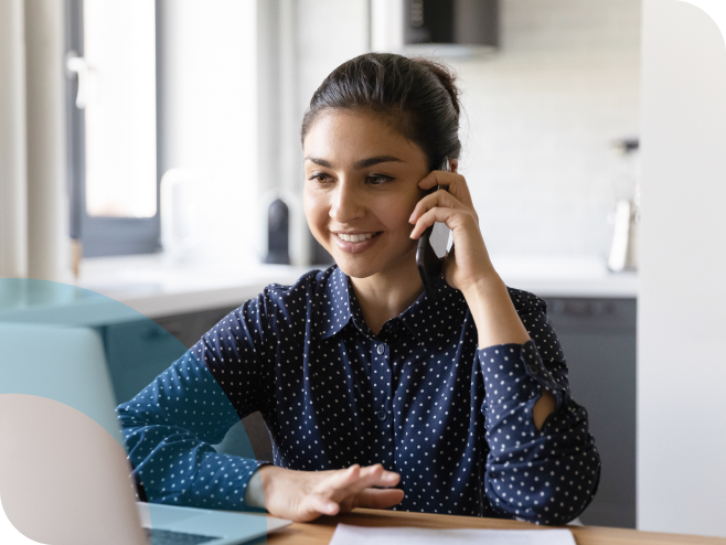  Happy young ethnic businesswoman have smartphone consultation with partner.